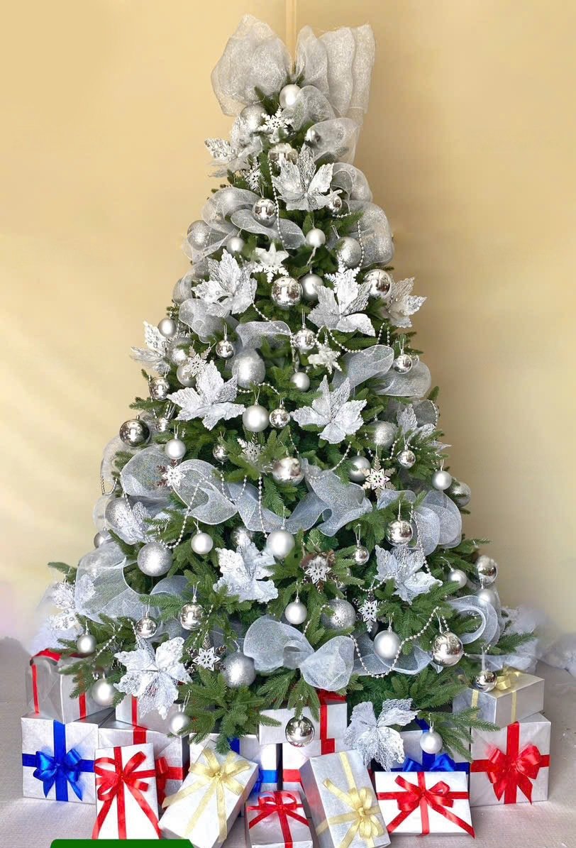 Modern white and silver Christmas tree concept for seasonal spaces